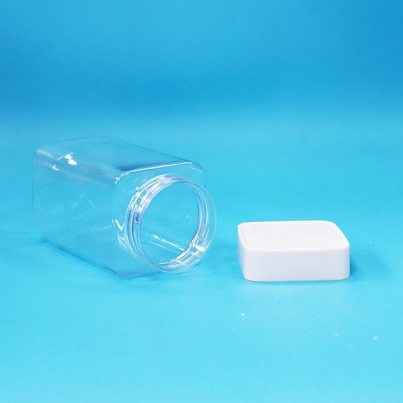 Żywność Przejrzysta kwadratowa Pustka PET Plastic Żywność Cukierki cukierkowe Jam Jar Biały pokrywkę