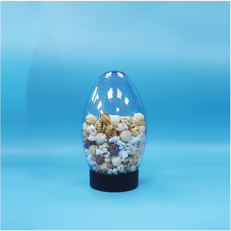 Unikalne jajko-kształtowe plastikowe słodycze popcorn pistachio orzechy słodycze słoik do góry do dołu płaska czapka