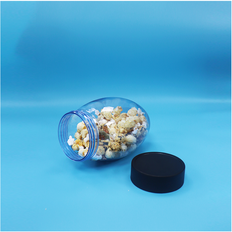 Unikalne jajko-kształtowe plastikowe słodycze popcorn pistachio orzechy słodycze słoik do góry do dołu płaska czapka
