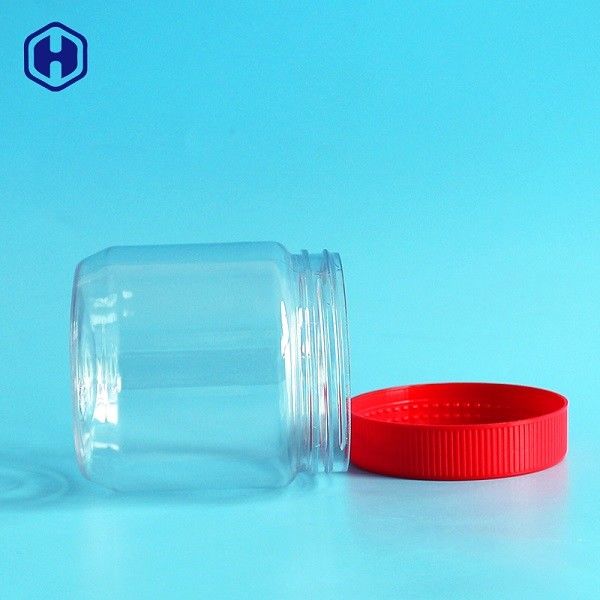 Małe, szczelne plastikowe słoiki z czerwoną zakrętką w pełni hermetyczne