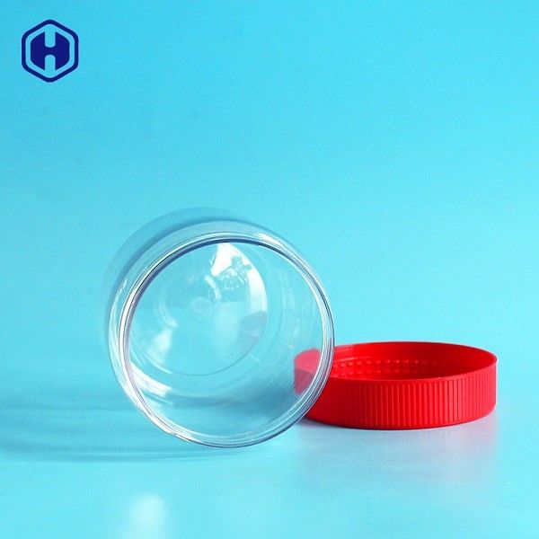 Małe, szczelne plastikowe słoiki z czerwoną zakrętką w pełni hermetyczne