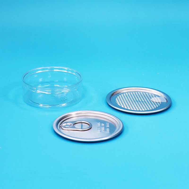 Okrągły plastikowy pojemnik PET z metalowym wieczkiem typu easy open do pakowania żywności, cukierków, ciasteczek i przekąsek