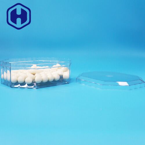 Puste pudełko do pakowania w kształcie ośmiokąta z suszonymi owocami, cukierkami, orzechami, ciasteczkami, wykonane z PET, przeznaczone do kontaktu z żywnością