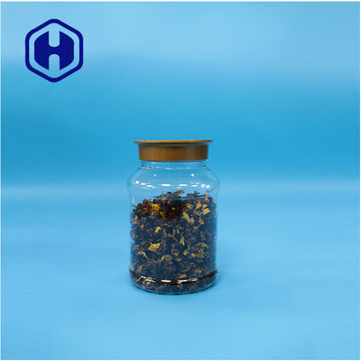 Okrągłe, przejrzyste opakowania żywnościowe, masło orzechowe, plastikowe ciasteczka, cukierki, słoiki