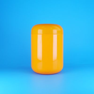 Szczelne, pomarańczowe, okrągłe, plastikowe słoiki PET na ciasteczka i watę cukrową, z pomarańczową zakrętką